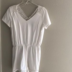 White romper shorts.